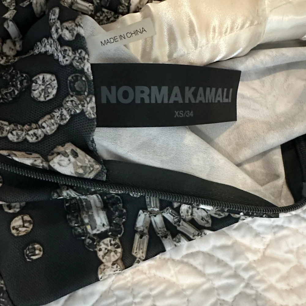 Norma Kamali Elegant moss green and white/silver dress